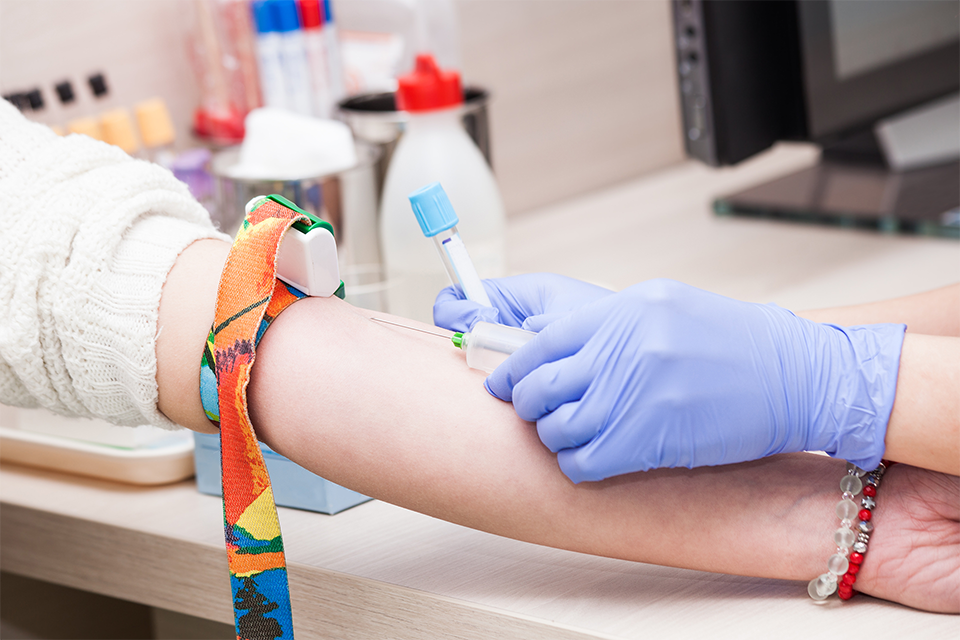 Nurse taking blood